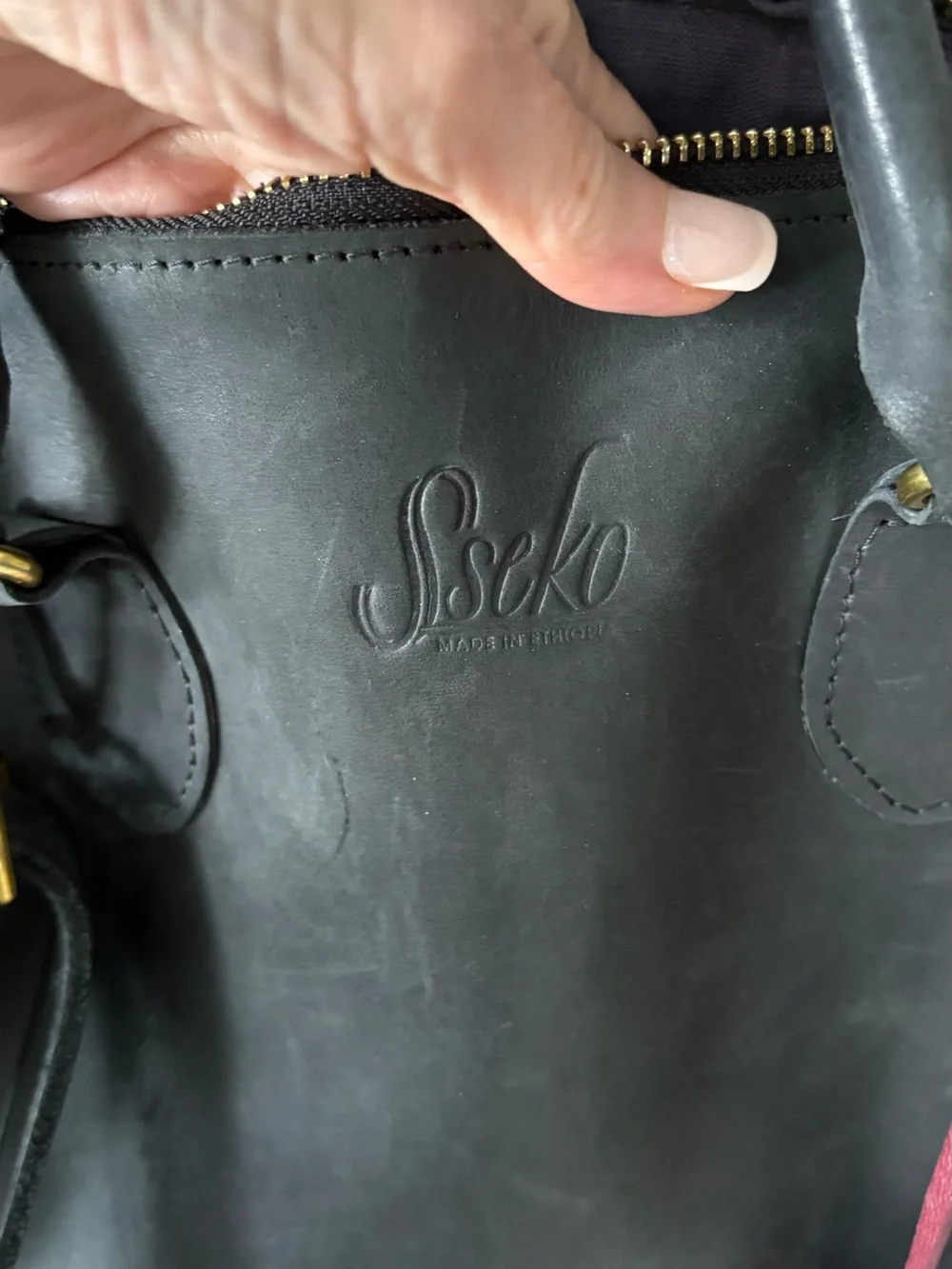 Sseko Black Leather Satchel with burgundy Tassel Charm